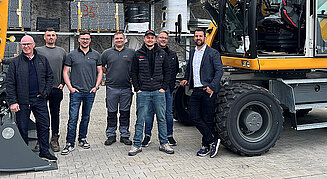 Schulungsteilnehmer der G8-Liebherr-Bagger-Schulung