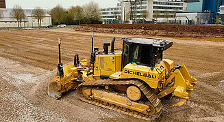 Maschinensteuerung auf einer Raupe - Hintergrund Baustelle